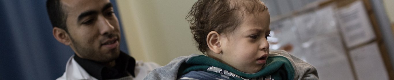 A doctor takes care of a child in an hospital in Gaza 