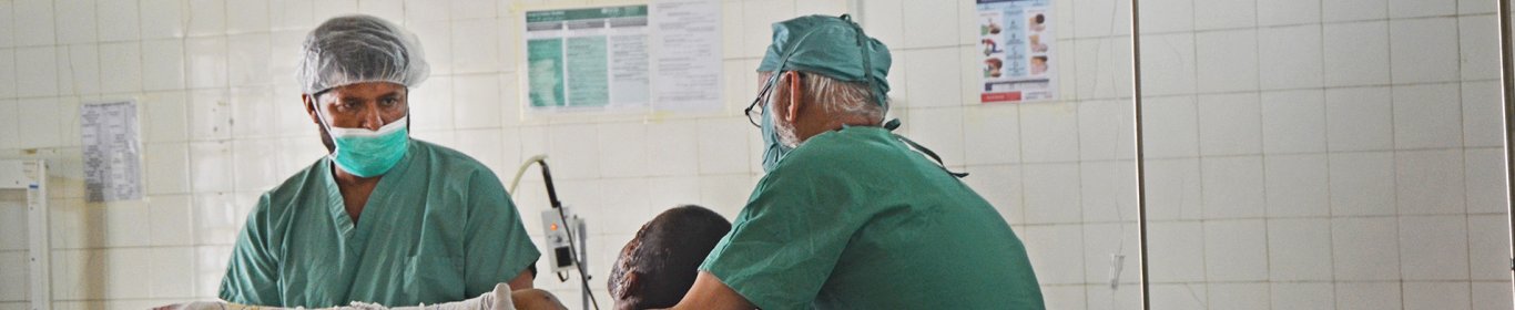 Medical staff prepare a 20-year-old Afghani man for surgery at the MSF supported hospital in Boost, Lashka Ghar, Afghanistan.