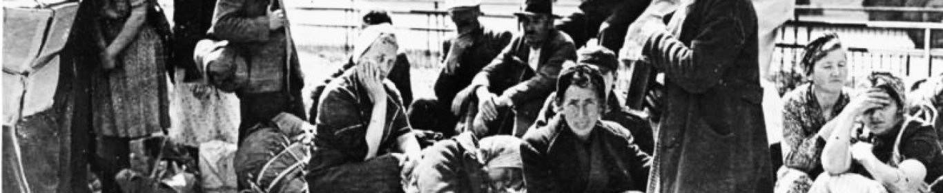 Refugees wait for transport, Berlin, June 1945.