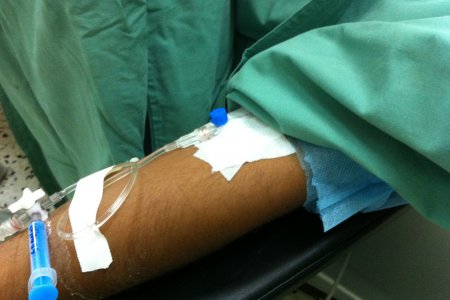 A patient's arm in Kasr Ahmed hospital in Libya