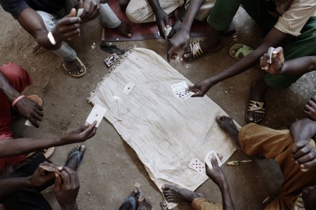 Men are playing cards