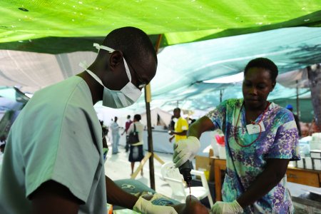 Haitian doctor and nurse during a surgery